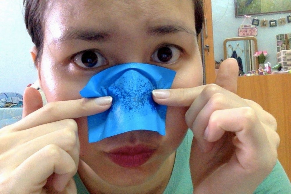 Dùng giấy thấm dầu